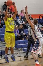 Andre Moore shoots in a district tournament game against Eastside Catholic.  Moore had 15 points in the game including three 3-pointers.