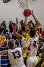 Nate Pryor shoots  in a district tournament game against Eastside Catholic.  Pryor was the high scorer for West Seattle with 21 points.