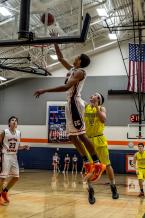 Matisse Thybulle shoots as West Seattle guard Tyler Lenzie defends. Thybulle had 32 points in the Eastside Catholic 79-56 win.