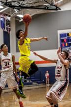 Akili Kasim shoots in a tournament game against Eastside Catholic.  Karim had 6 points