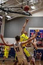 Nate Pryor shoots in a district tournament game against Eastside Catholic.  Pryor was the high scorer for West Seattle with 21 points.