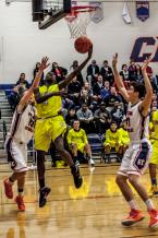 Chaaka Trahan shoots in a district tournament game against Eastside Catholic. Trahan had 8 points in the game.