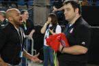 Chief Sealth coach, Maurice Dolberry, talking to another coach during the Mat Classic state meet at the Tacoma Dome.