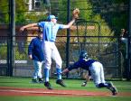 A throw to first goes high past Mason Moe (left) of Chief Sealth as Kevin Cuddy of West Seattle dives into the bag. Cuddy was later tagged out as he stood up and stepped off the base. Photo by Patrick Robinson