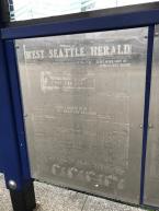 Featured in the shelters are pages of the West Seattle Herald from our archives