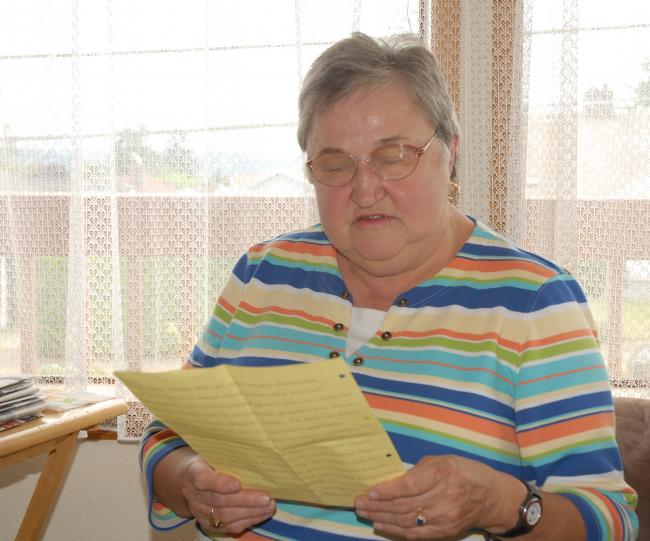 Amanda, Oma reads letter.jpg